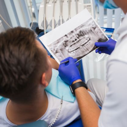 Doctor reviewing xrays